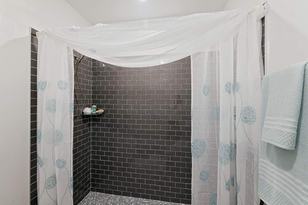Walk-in shower in a model home at Beverly Villas in Brunswick, Georgia