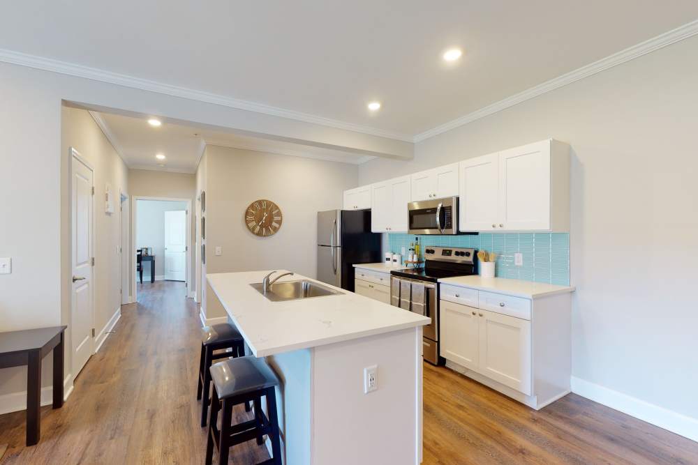 Kitchen with in a model home at Coastal Club Apartments in Brunswick, Georgia