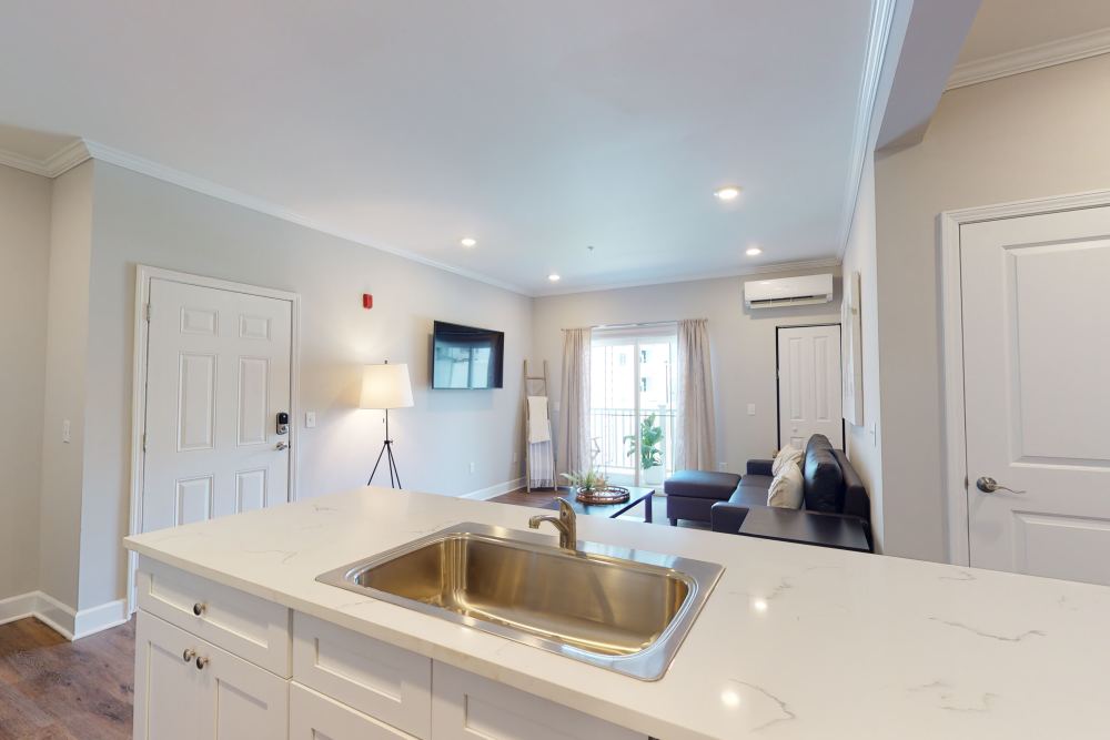 Kitchen island with sink at Coastal Club Apartments in Brunswick, Georgia