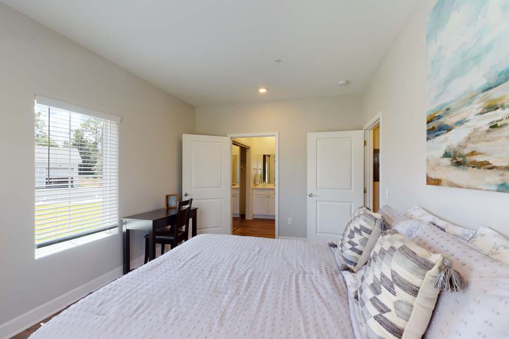 Cozy bedroom at Coastal Club Apartments in Brunswick, Georgia
