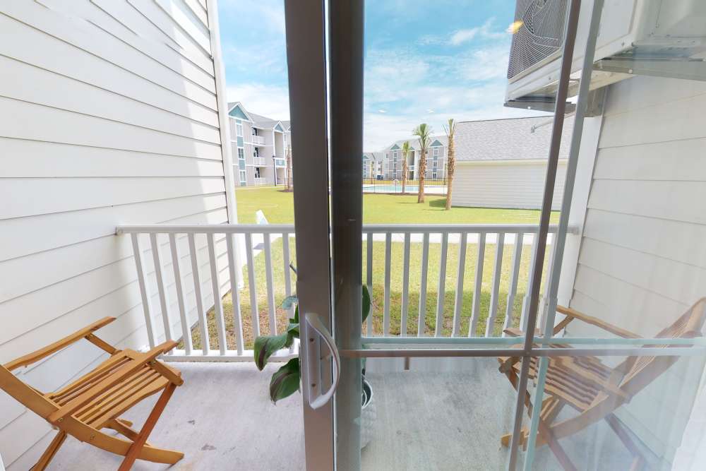 Private balcony in a model home at Coastal Club Apartments in Brunswick, Georgia