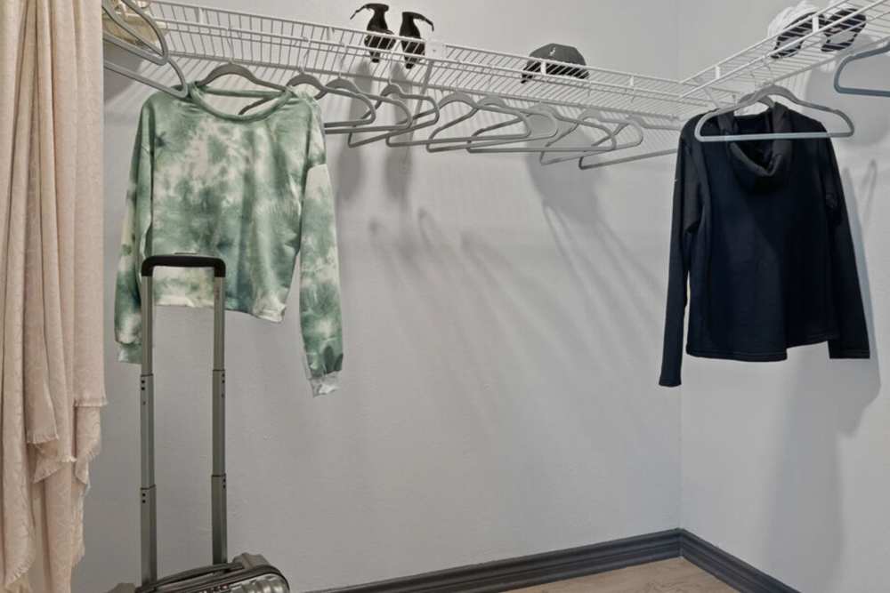 Closet area connected to the bedroom at Hill At Woodway in San Antonio, Texas