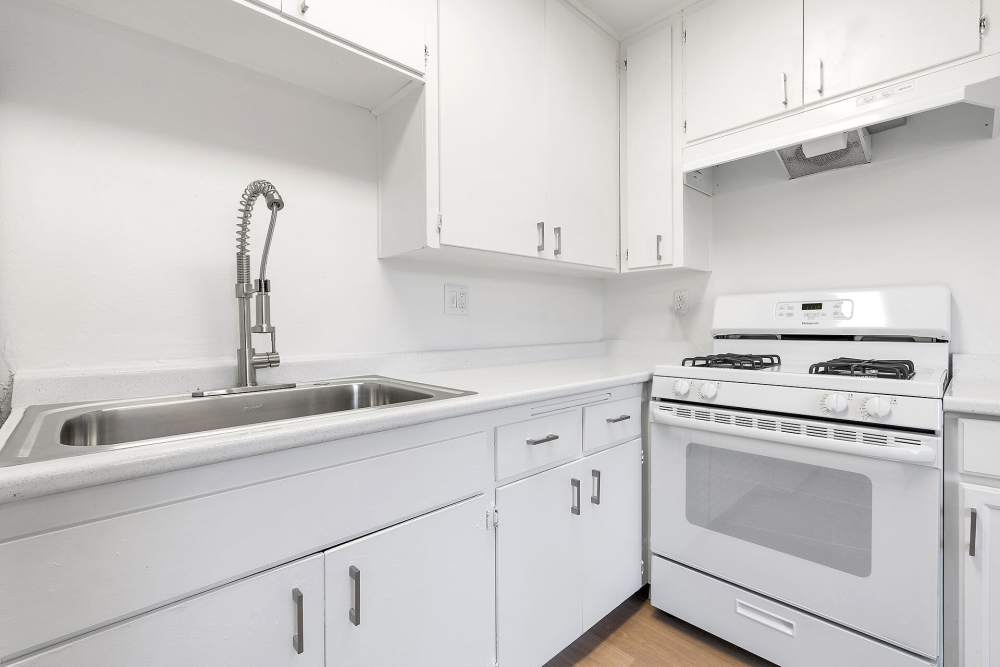Modern kitchen appliances at Terre at Madison Apartment Homes in El Cajon, California