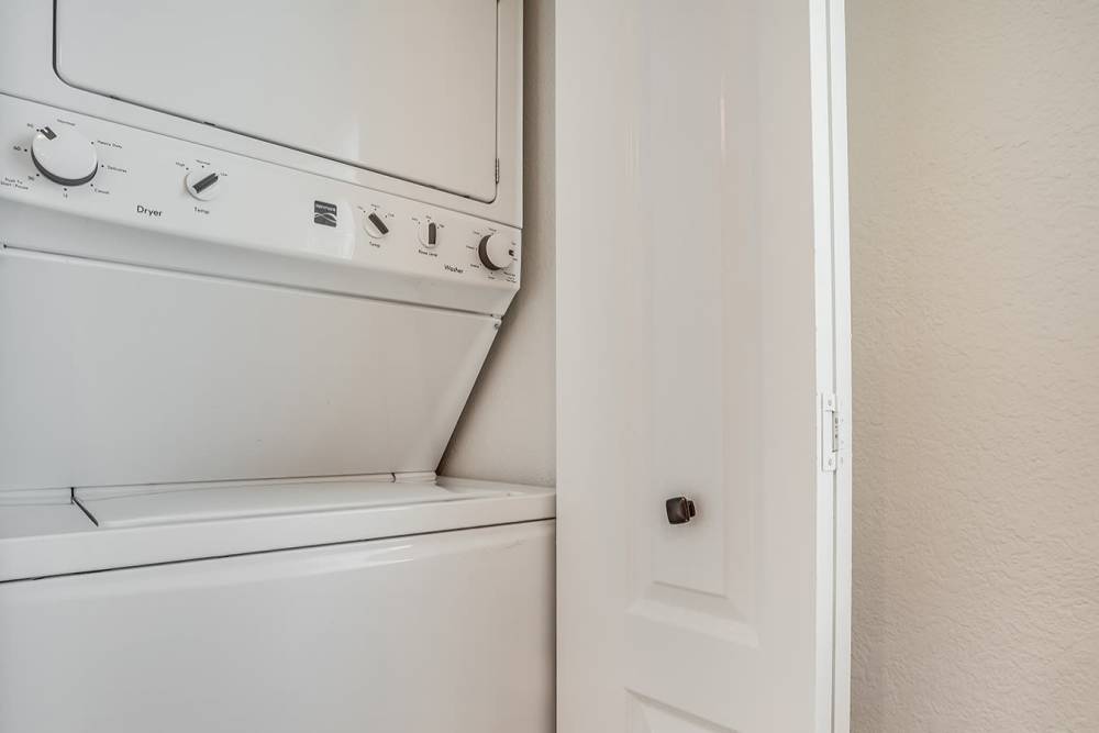 Washer and dryer in apartment at Trails at 2112 in Modesto, California