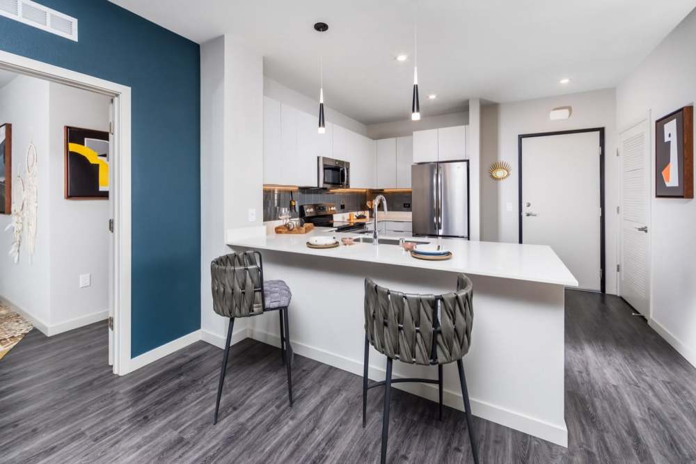 Kitchen with counter stools at Reno Experience District in Reno, Nevada