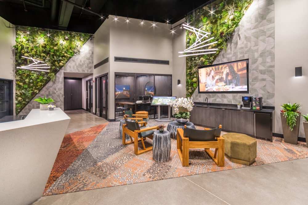 Leasing office seating and TV at Reno Experience District in Reno,