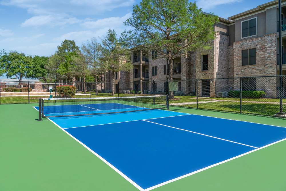 Lighted pickleball court at The Springs of Indian Creek in Carrollton, Texas