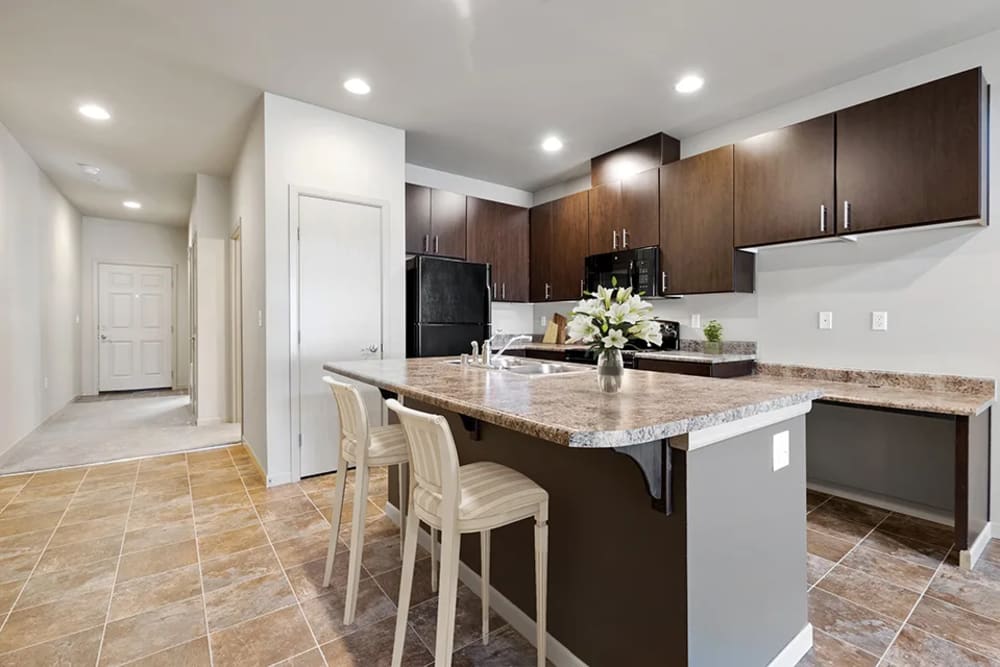Kitchen with island at Yauger Park Villas in Olympia, Washington