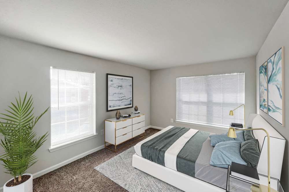 Master bedroom with a large rug at Montgomery Club in Gaithersburg, Maryland