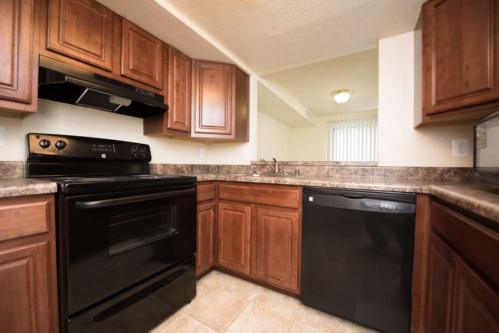 Model kitchen with black appaliances at Montgomery Club in Gaithersburg, Maryland