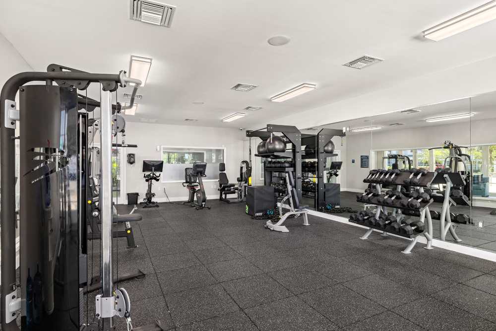 Resident fitness center with weight machines at Bermuda Cay in Boynton Beach, Florida