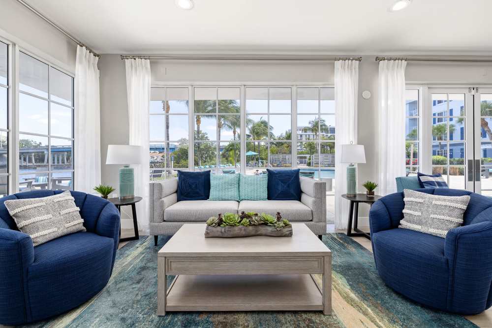 Resident clubhouse with comfortable sofa and chairs at Bermuda Cay in Boynton Beach, Florida