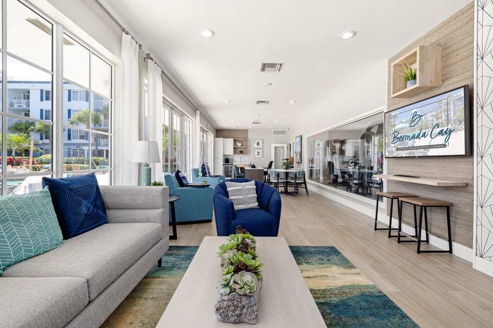 Resident clubhouse with comfortable sofa at Bermuda Cay in Boynton Beach, Florida