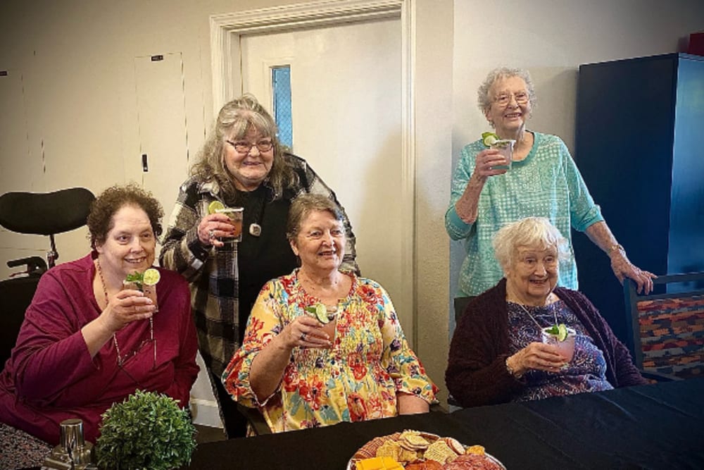 Residents enjoying their drinks at Woodside Senior Living in Springfield, Oregon