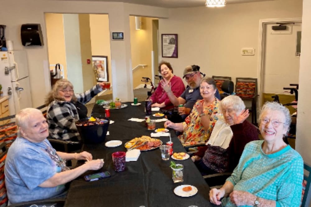 Residents enjoying a party at Woodside Senior Living in Springfield, Oregon