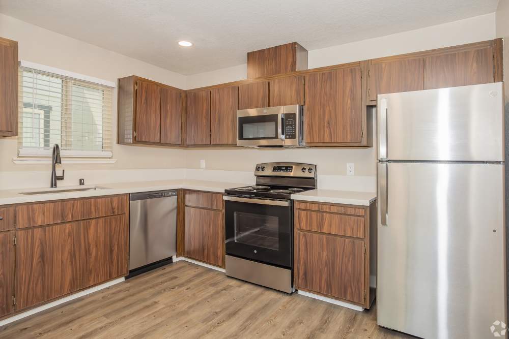 Kitchen with modern appliances at El Macero Apartments in Davis, California