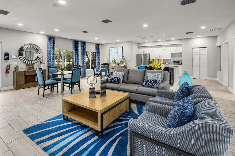 Trendy resident clubhouse with cafe area at Boynton Place Apartments in Boynton Beach, Florida