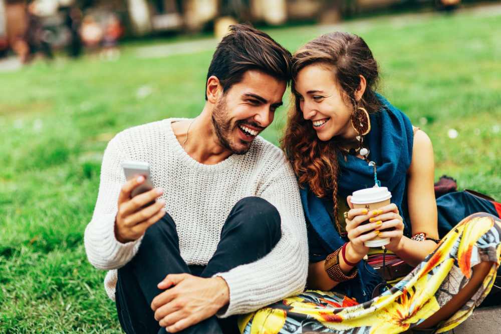 Resident couple sitting in a park near Shenandoah Commons in Front Royal, Virginia