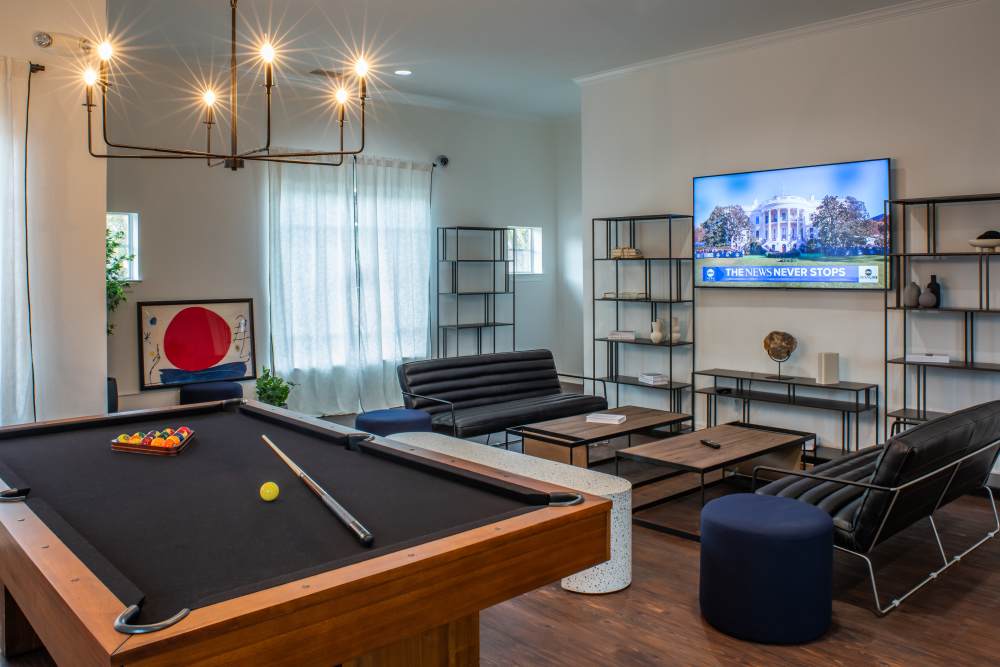 Resident lounge with billiard table at The Reserve on West 31st in Lawrence, Kansas