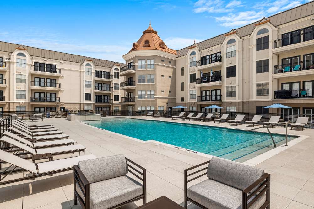 Resort-style swimming pool at Chateau de Ville in Farmers Branch, Texas