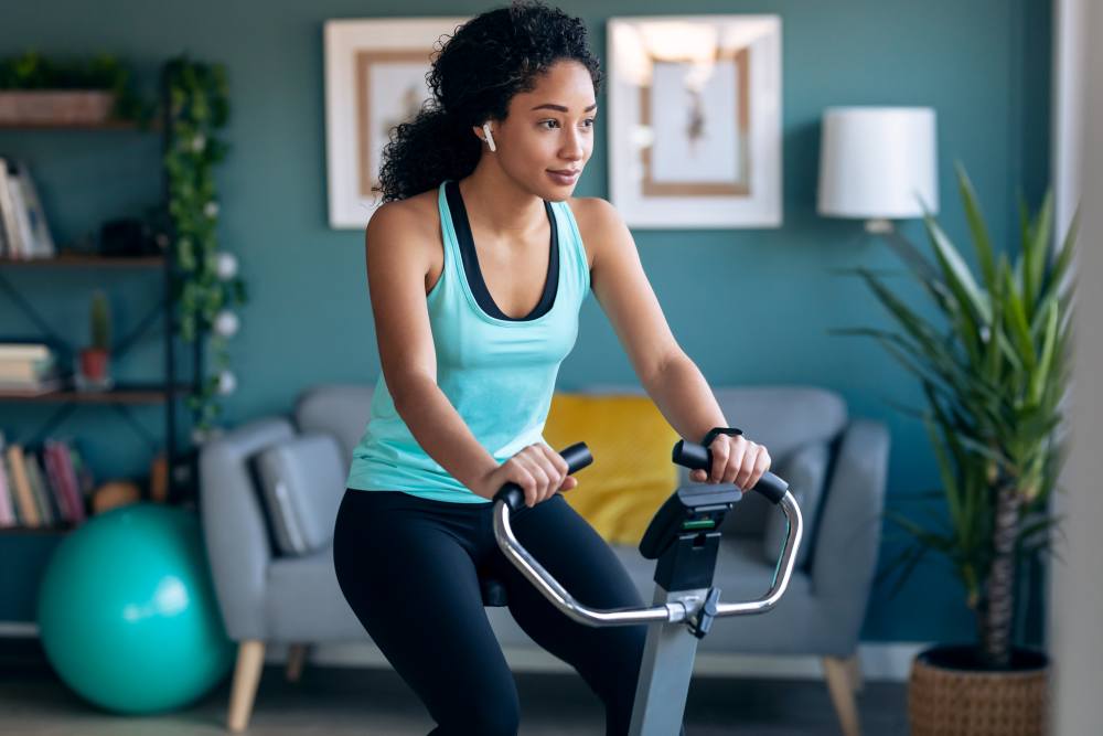 Resident working out at Evergreen Park Townhomes and Apartments in Lansing, Michigan