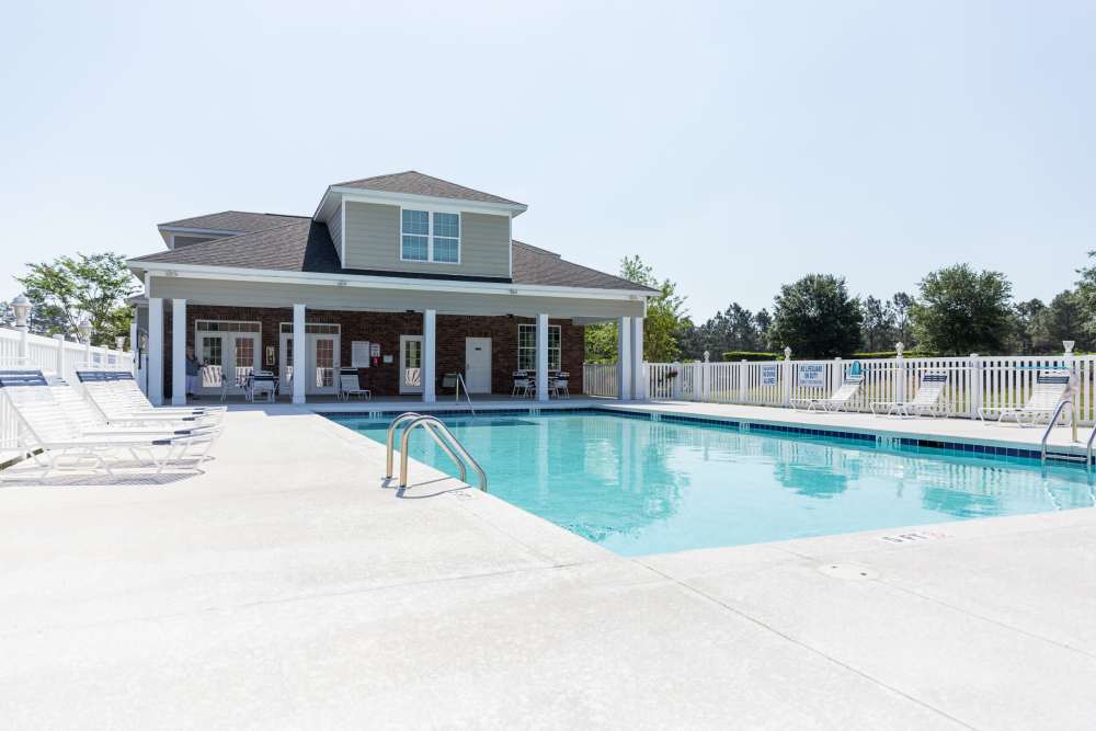 The gated, sparkling community swimming pool at Cloisters at Carolina Forest in Myrtle Beach, South Carolina