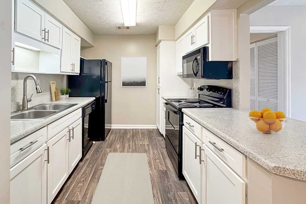 Simple and clean kitchen at Brittwood Apartments in Columbus, Georgia