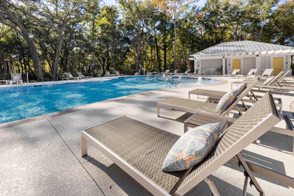 Swimming pool with lounge chairs at Park Circle Village in North Charleston, South Carolina