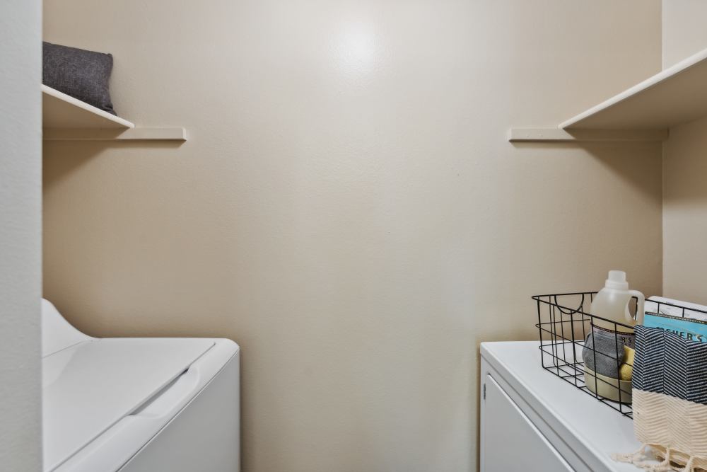 In-home laundry in a model unit at Madison Sammamish Apartments in Sammamish, Washington