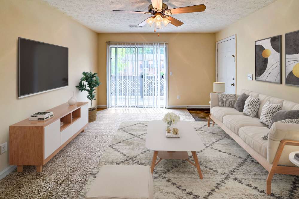 Our Apartments are Great for entertaining in Columbus, Georgia and showcase a Living Room with flat screen television and aesthetic furtniture