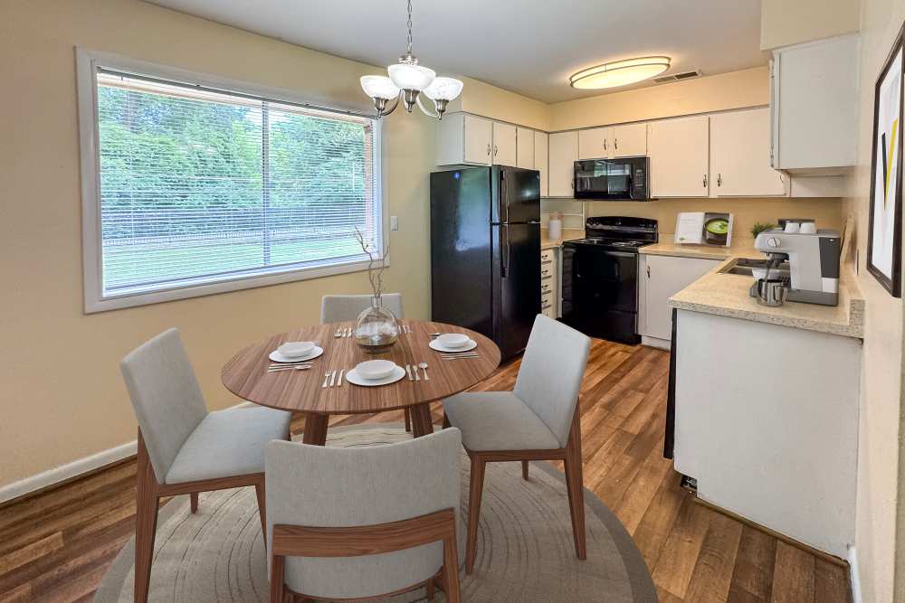 Cozy Apartments with a Dining Room that has pendant light at Gardenbrook Apartments