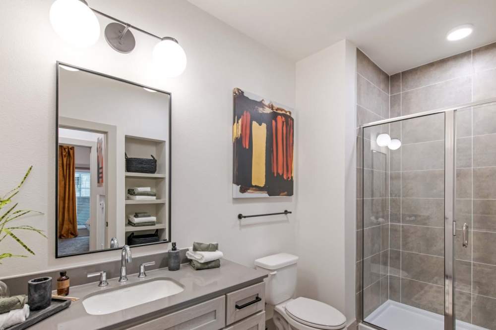 Modern finishes in an apartment bathroom at Hudson on 158 in Midland, Texas
