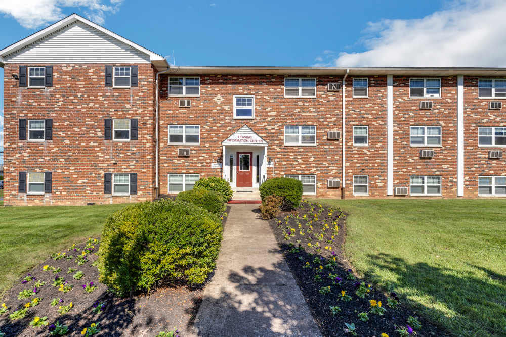 Exterior view of brick apartment building at Congress Apartment Homes in Allentown, Pennsylvania