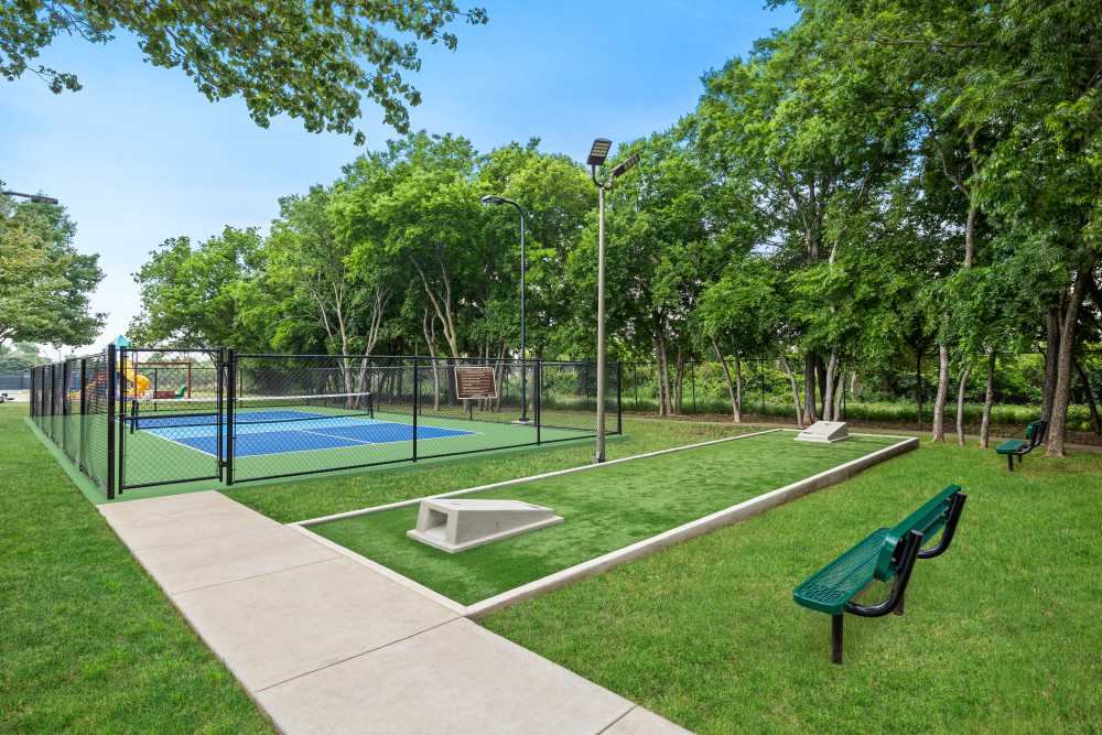 Cornhole Game and pickleball court at Lakeview at Parkside in Farmers Branch, Texas