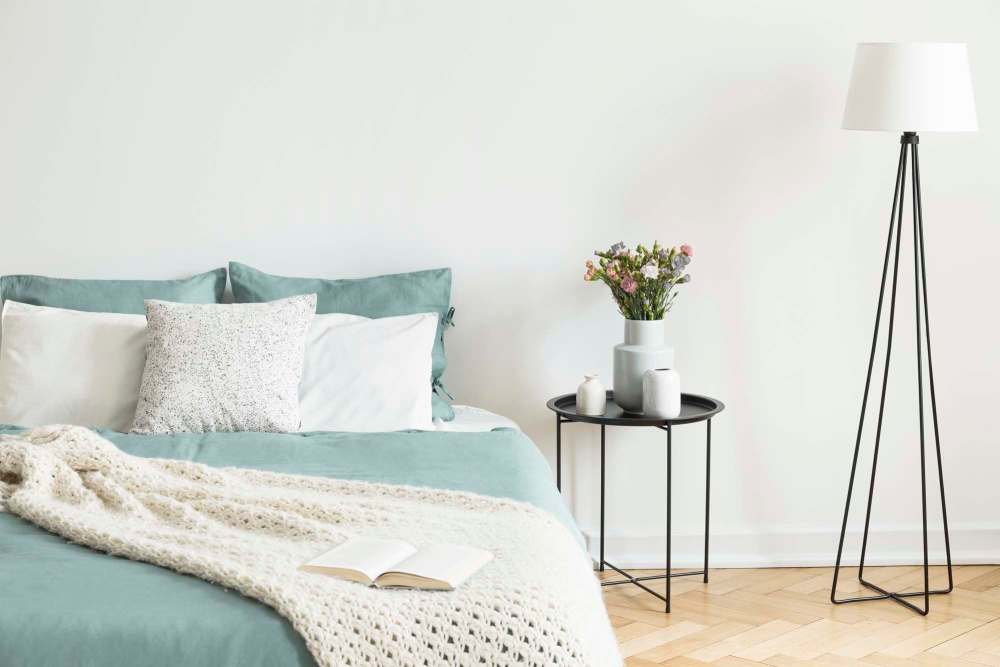Spacious bedroom with large comfortable bed at Avalon in Davis, California