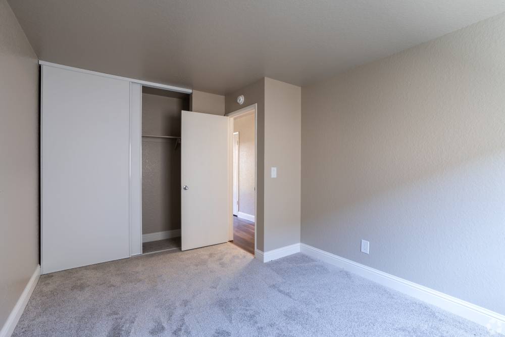 cozy bedroom at Alderwood Park Apartments in Livermore, California