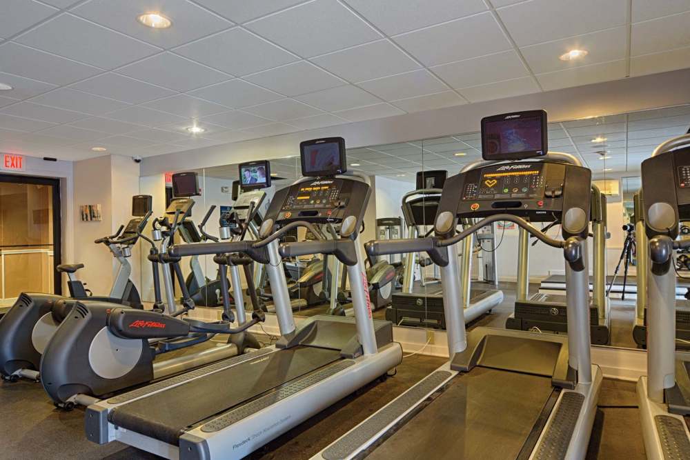 Treadmills in the work out area at Eagle Rock Apartments at Framingham memory care in Framingham, Massachusetts