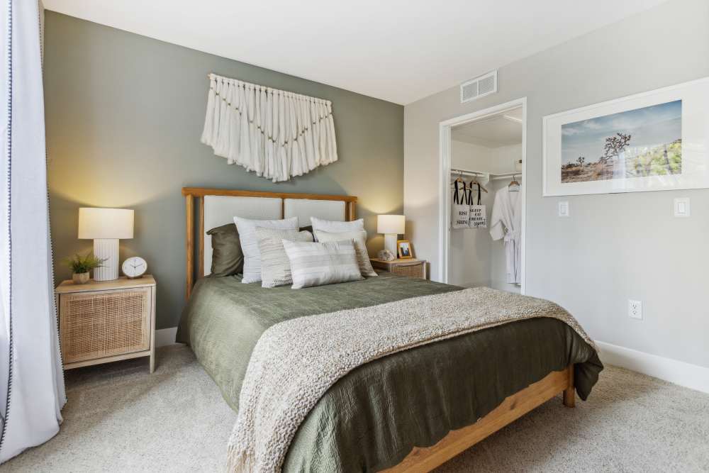 Warm and cozy model bedroom with plush carpeting at Avery at Moorpark in Moorpark, California