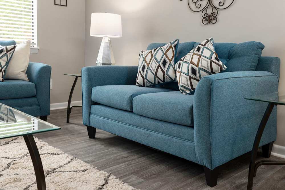 Comfy couch in a living room at Cross Creek in Columbus, Georgia