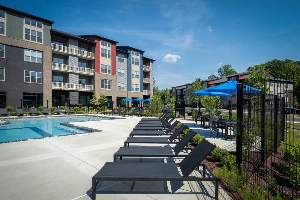 Pool and outdoor lounge area at Elms at the Refuge in Laurel, Maryland