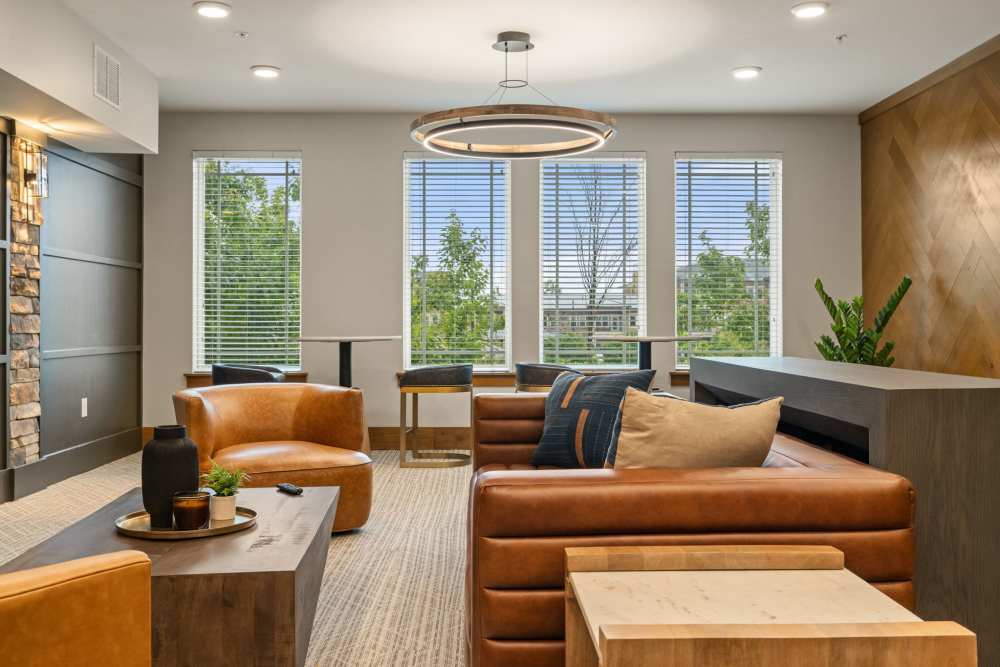 Comfy couches in  Caliber at Hyland Village in Westminster, Colorado