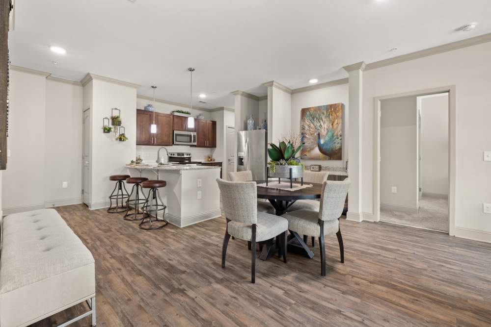 Wide shot of the Unit's Kitchen and Dining area in {location_name}} in Westminster, Colorado