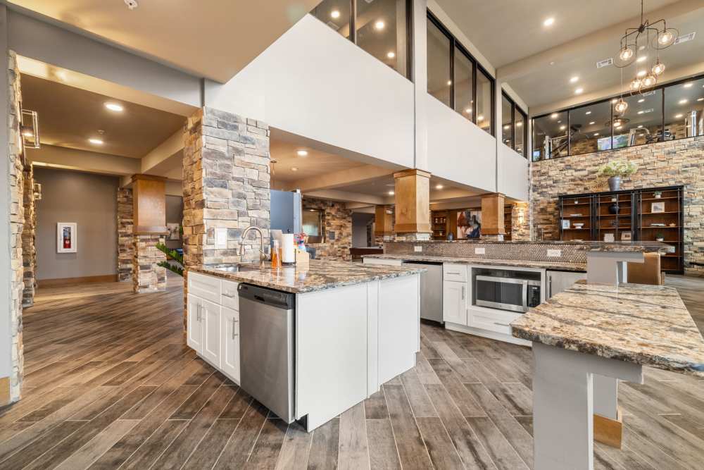 Wide shot of the kitchen area on Caliber at Hyland Village in Westminster, Colorado
