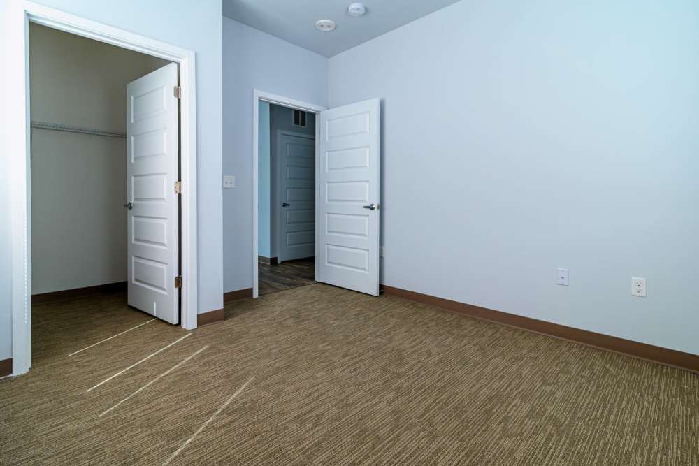 Bedroom with closet at Marketplace in Flint, Michigan