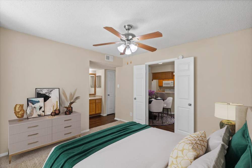 Bedroom with a ceiling fan at Pear Ridge in Dallas, Texas