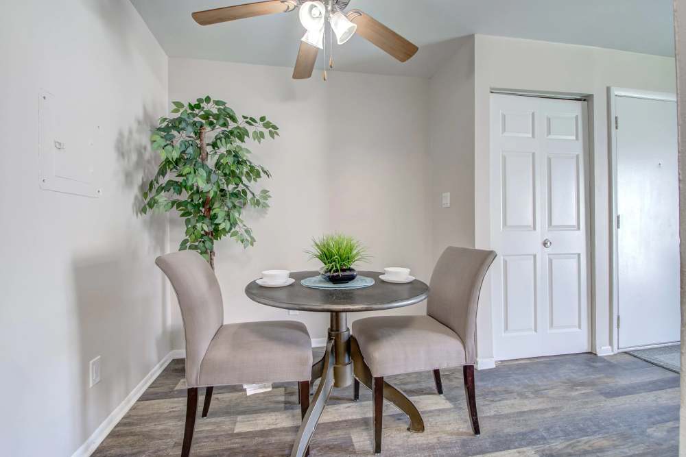 Dining room with ceiling fan at Hidden Creek, Crown Point, Indiana