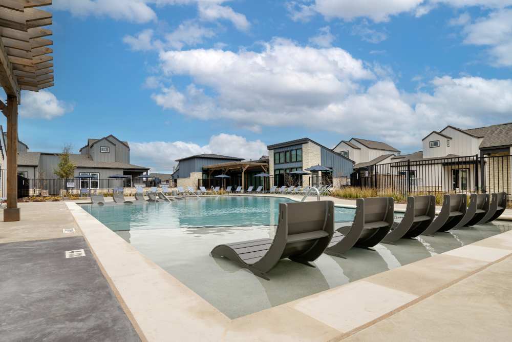 Luxurious swimming pool  at parcHAUS AT CELINA PARKWAY in Celina, Texas
