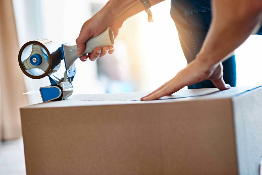 Person taping a box Hometown Self Storage in Battle Ground, Washington