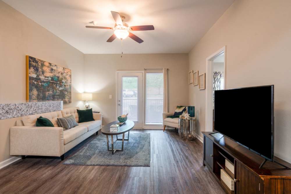 Modern living room at Cornerstone Apartments in Independence, Missouri. 