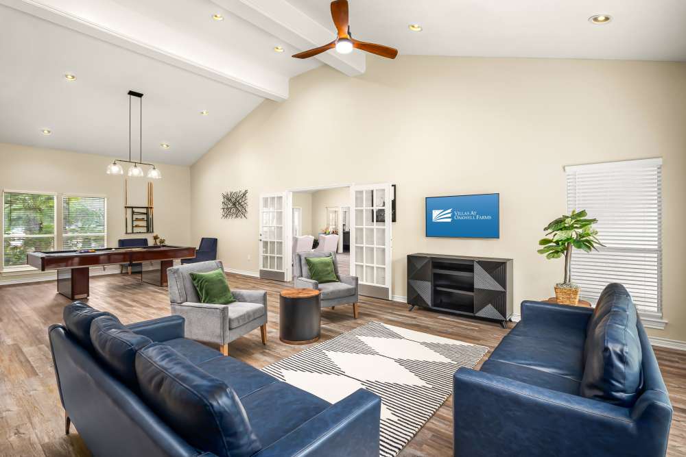 CLubhouse with pool table at Villas at Oakwell Farms in San Antonio, Texas